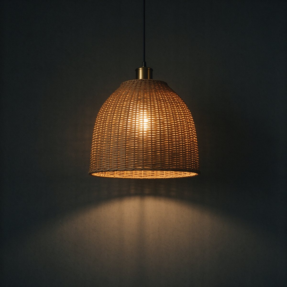 Dusk rattan pendant lamp glowing warm